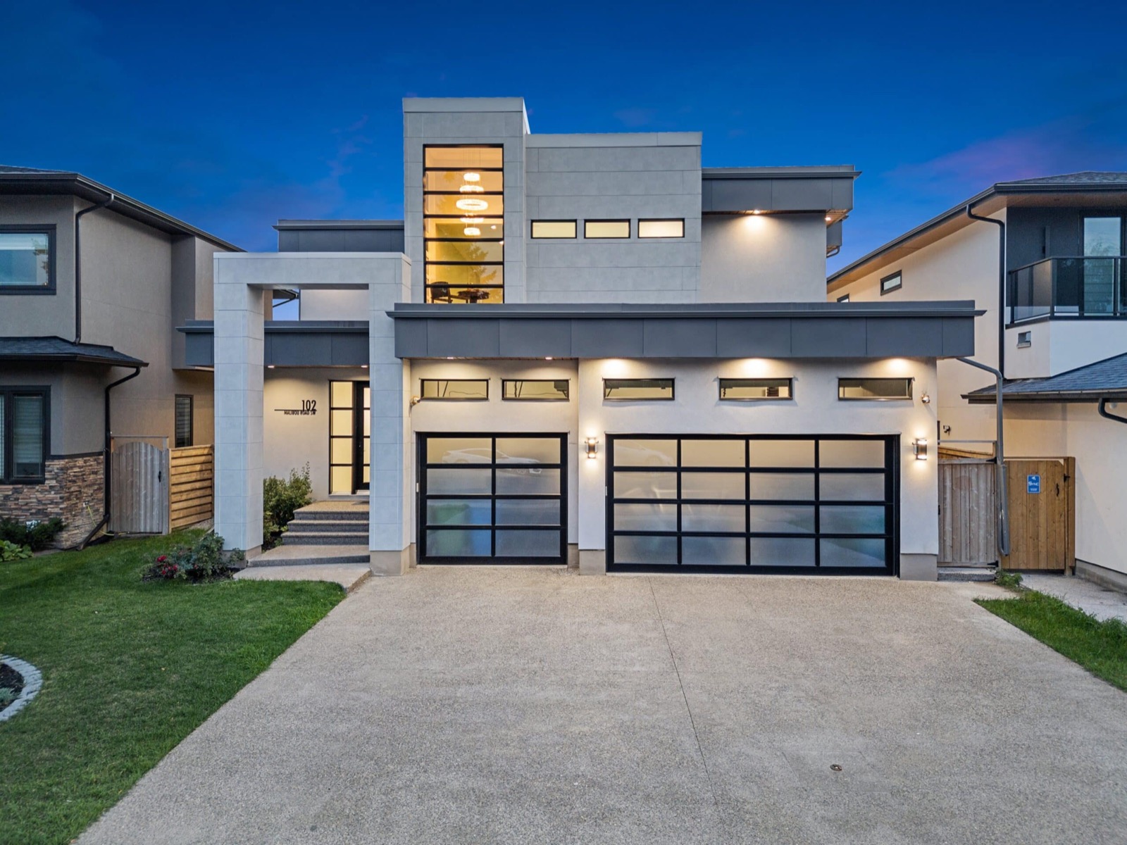 Luxury home in Calgary, Alberta photographed at dusk for Rivers Real Estate — the presentation standard Spencer Rivers relists expired listings with